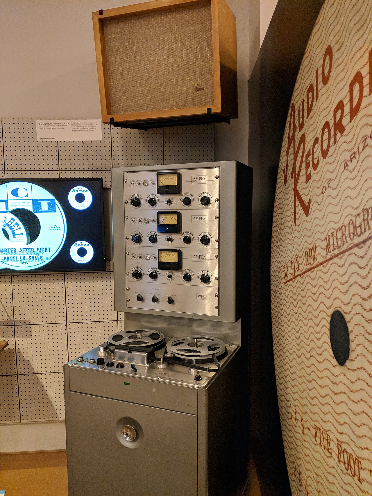 An Ampex three-track tape recorder, its three channel modules stacked above the transport.