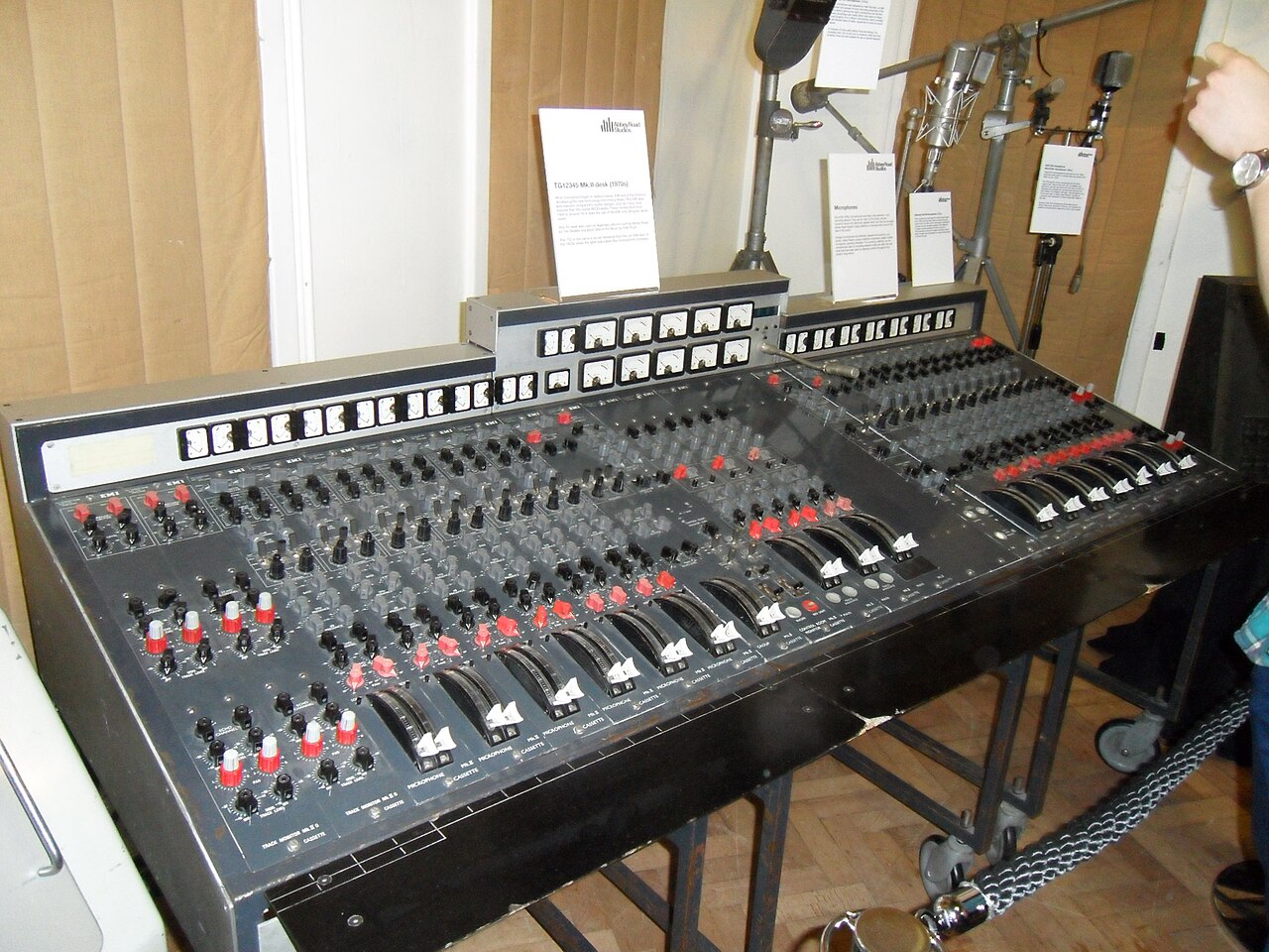 The EMI TG12345 Mk II mixing desk at Abbey Road Studios, showing rows of channel strips and VU meters.